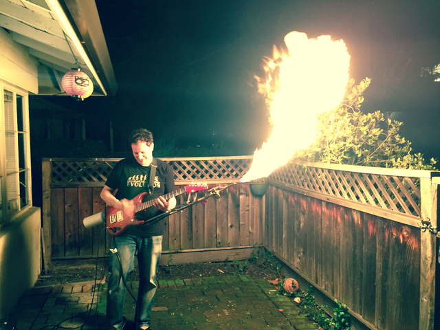 Luca Baldini and the flamethrowing guitar, presented to him by colleagues when he stepped down as Fermi analysis coordinator in 2016 to help develop IXPE.